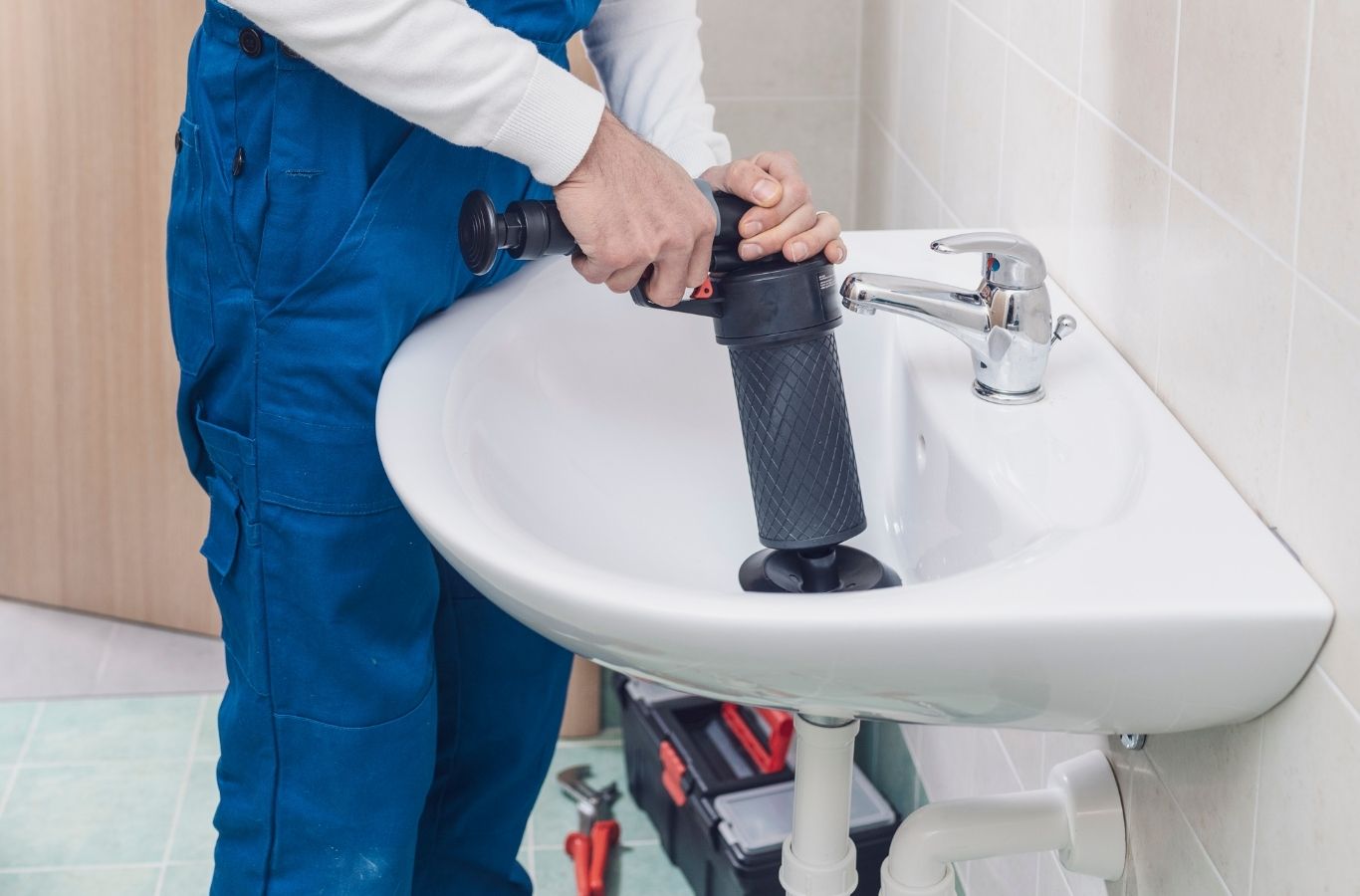Saving Plumbing technician performing expert plumber services in Lilburn using modern tools and professional skills to deliver efficient repairs and dependable plumbing solutions.