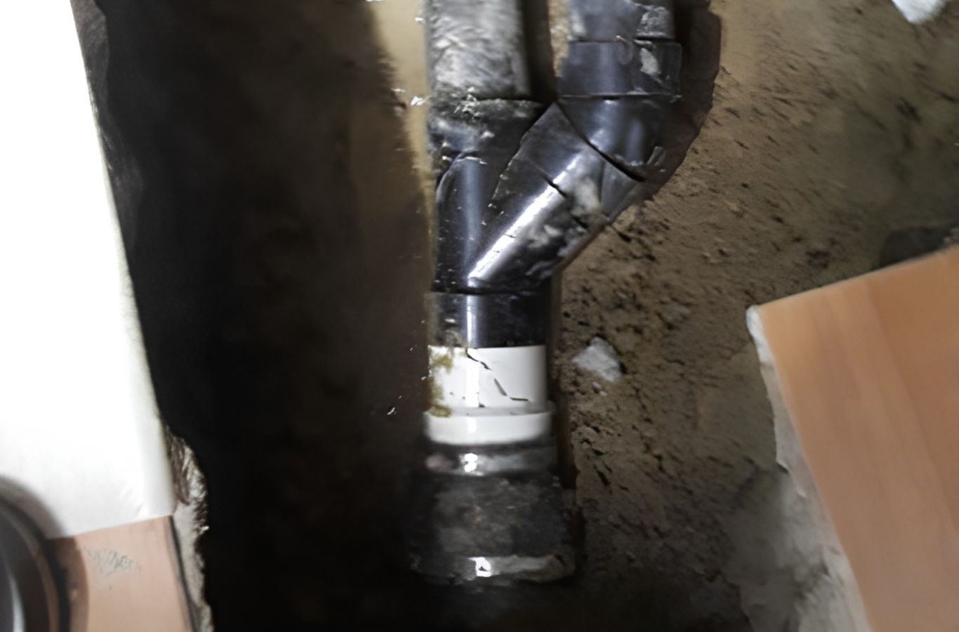 Experienced plumber tracing underground sewer issue with camera and diagnostic equipment. Sewer Line Repair near me.